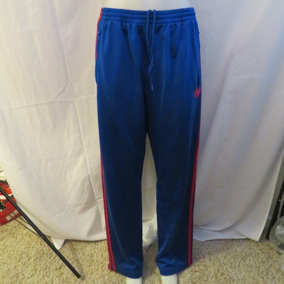 adidas track pants blue with red stripes